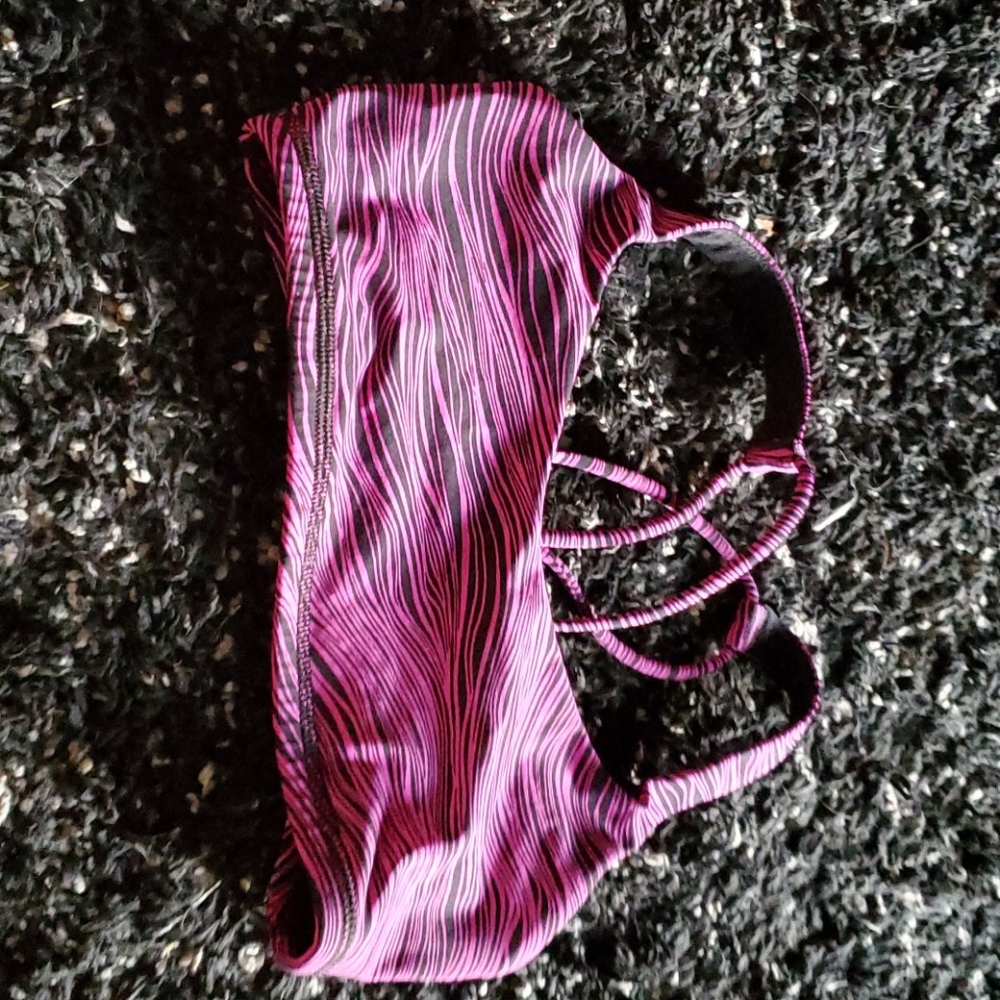 Black and pink zebra brallet or sports bra.